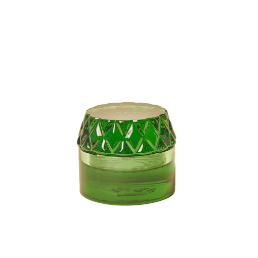 A Green Glass Grinder from HOUSE PLANT sits against a white background. One of our best products for Memorial Day Weekend.